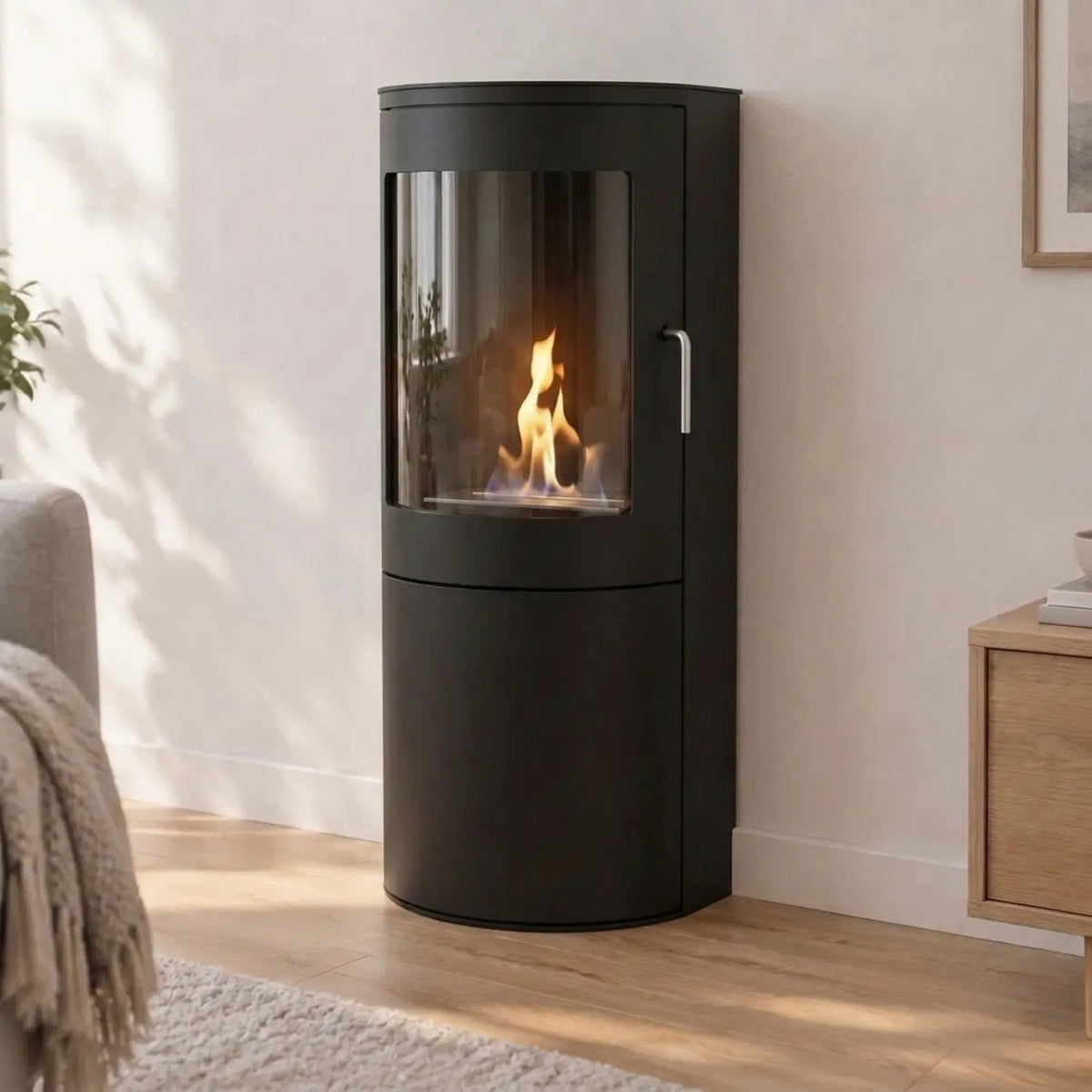 Richmond bioethanol fire stove with flat back standing flush against a living room wall, lit flame, matte black finish