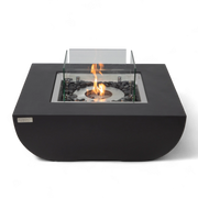 Aurora bioethanol fire pit in matte black with glass windscreen and bronze fire glass