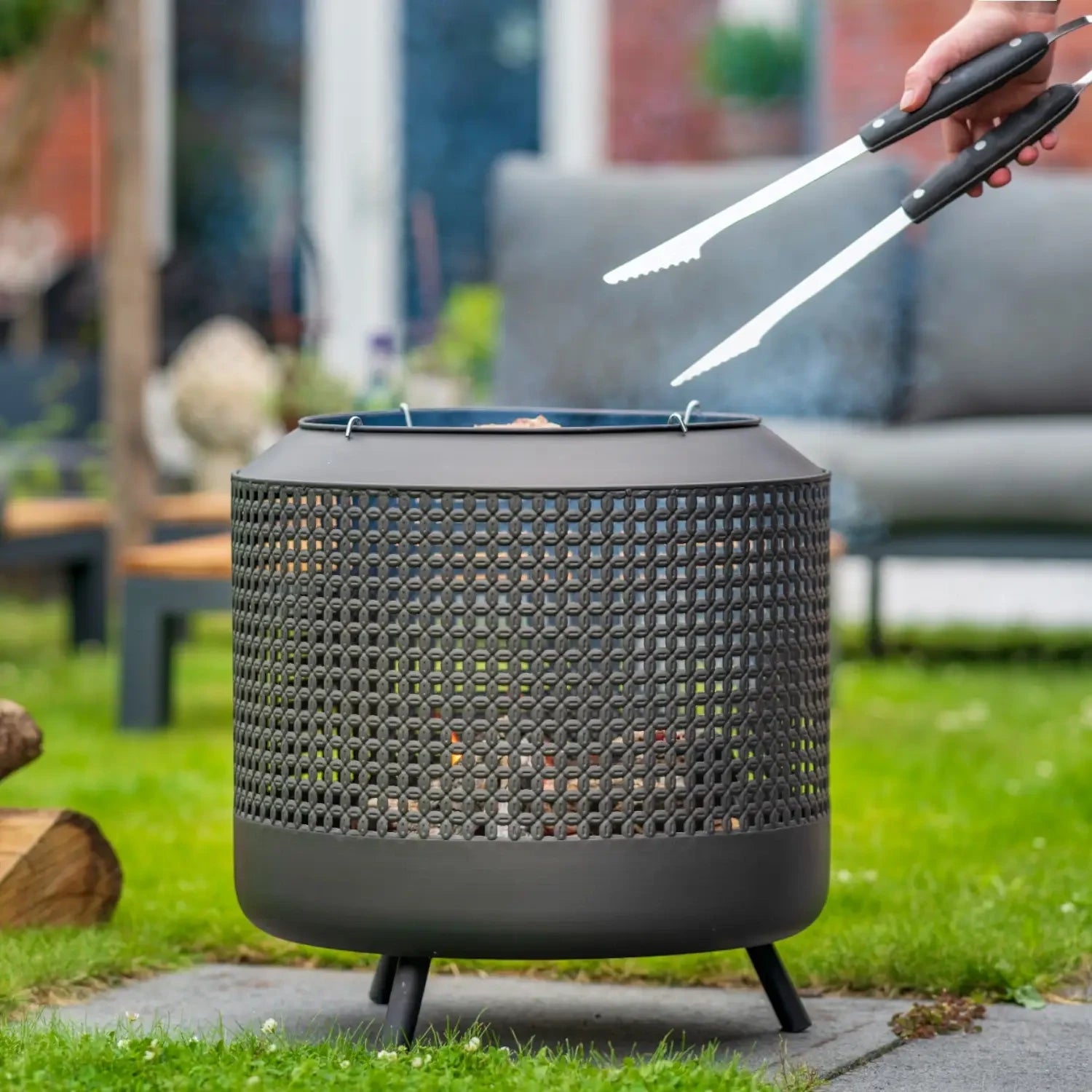 Midland fire basket with grill rack, designed for outdoor heating and cooking with a stylish design