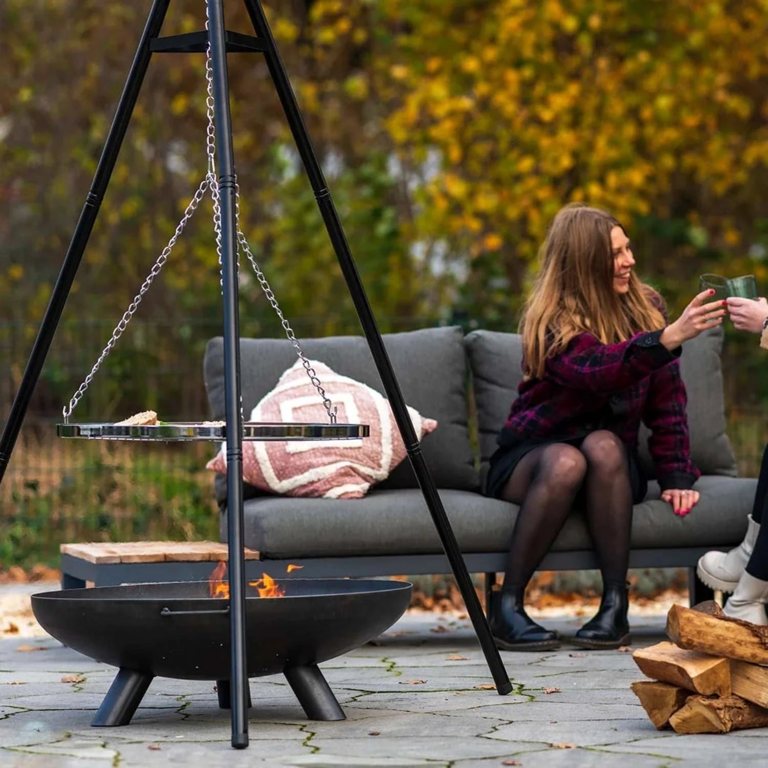 BBQ tripod, designed for grilling over an open flame with stability and versatility