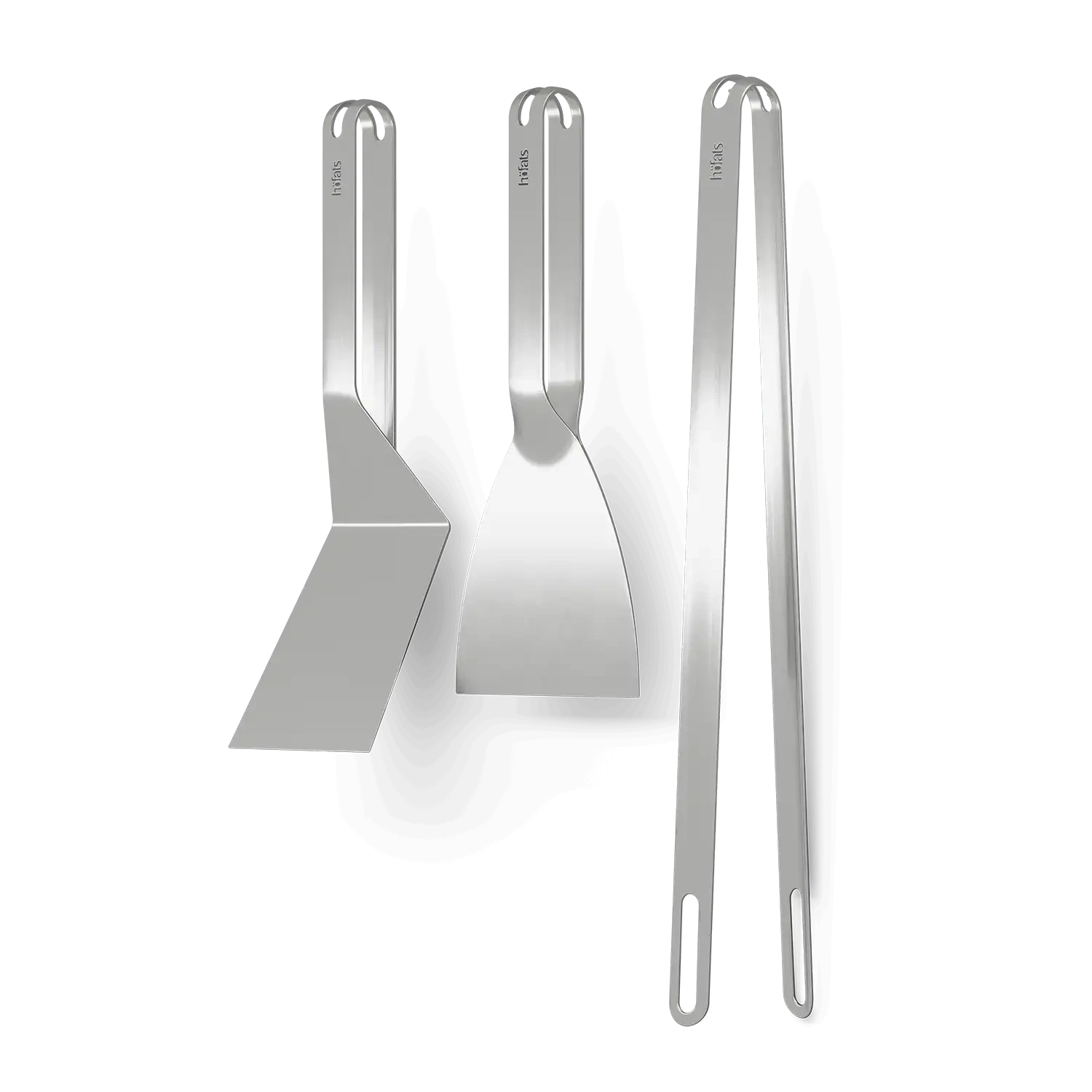 Höfats Grill Tool Set consisting of grill tongs, grill scraper, and spatula