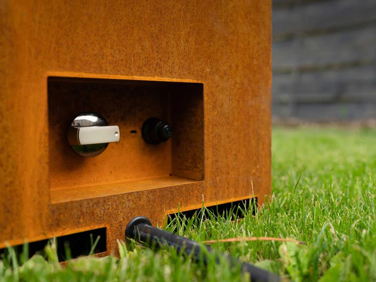 Planika Galio Outdoor gas fireplace in corten steel finish and with manual control system