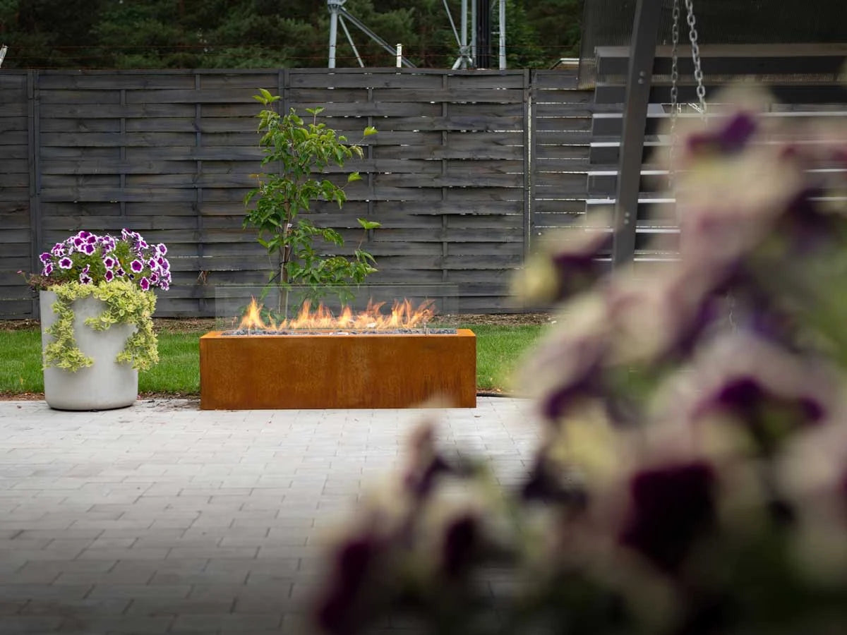 Planika Galio Outdoor gas fireplace in corten steel finish and with manual control system