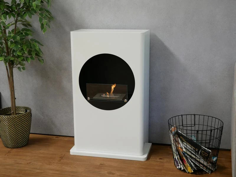 Bio chimenea de color blanco con un corte redondo