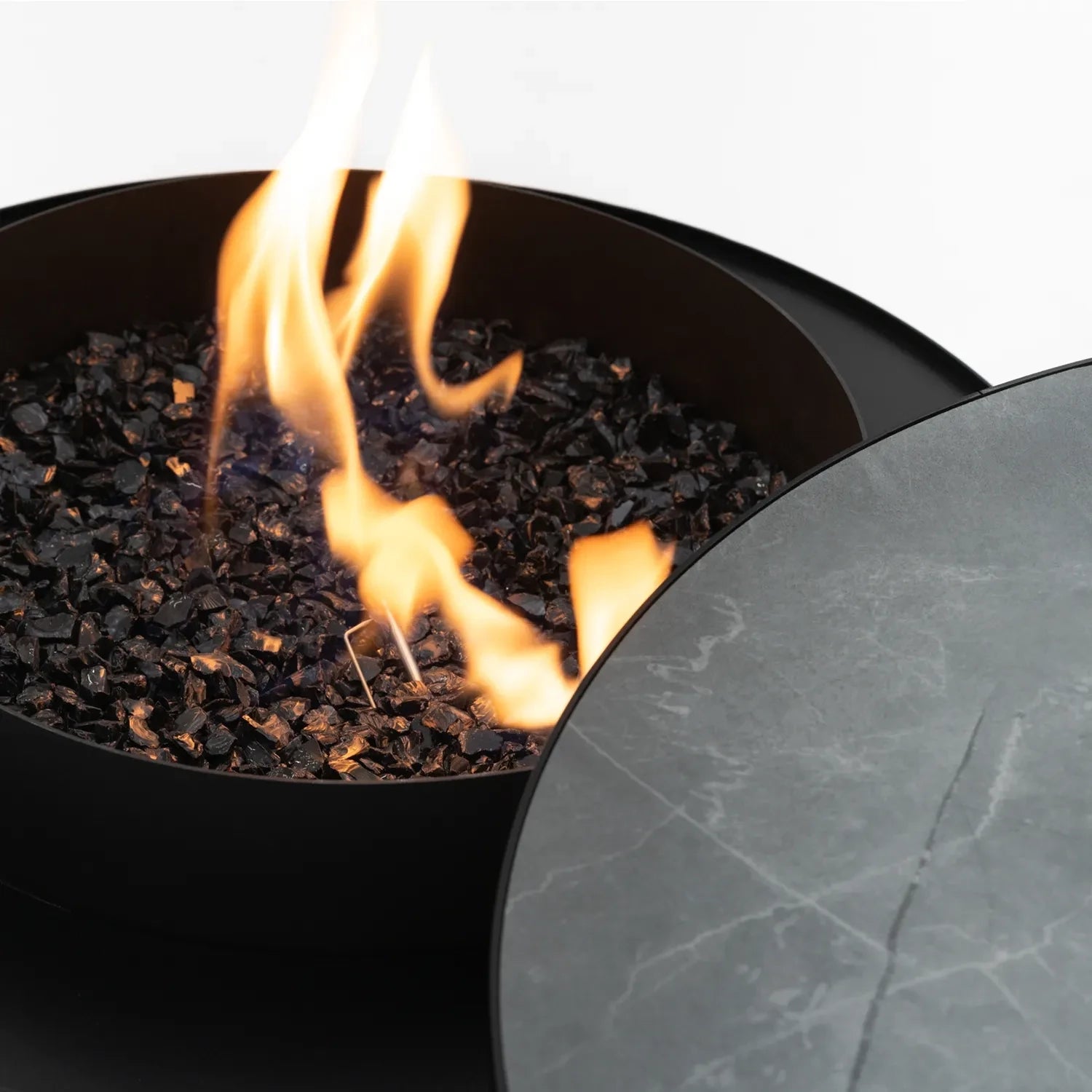 Planika Moon black freestanding outdoor gas fire table with ceramic marble finish tabletop