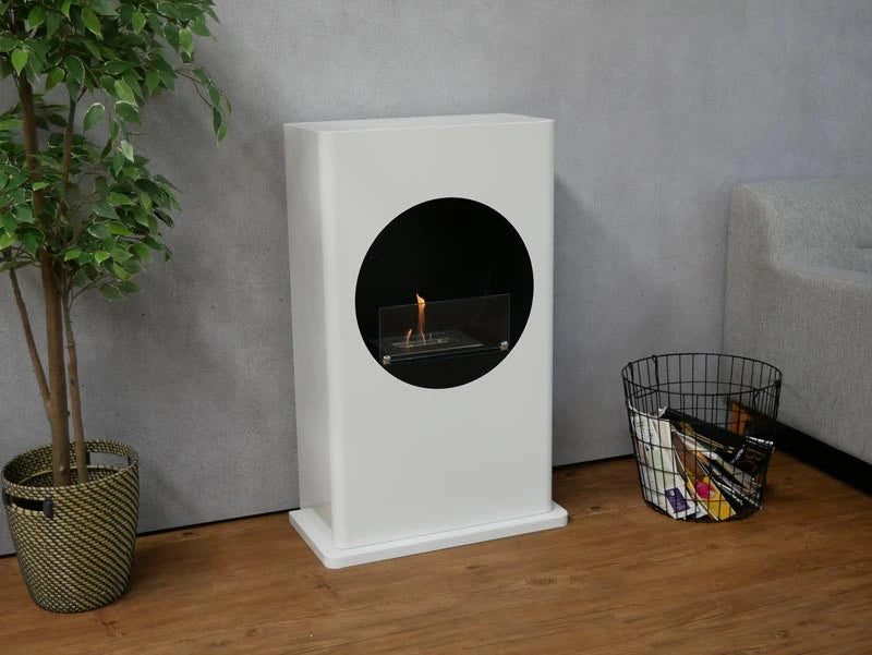 Bio chimenea de color blanco con un corte redondo