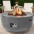 Mesa en para ma de cuenco - Chimenea de gas con diseño sencillo. Exterior, Patio, Jardín.