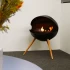 Chimenea de bioetanol circular independiente con tres patas de madera de roble