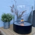 chimenea de mesa y sobre mesa de forma circular